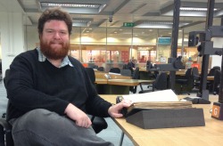 Trevor Ford, doctoral candidate in history and SSHRC recipient, examining the Colonial Office files at the National Archives in London, England