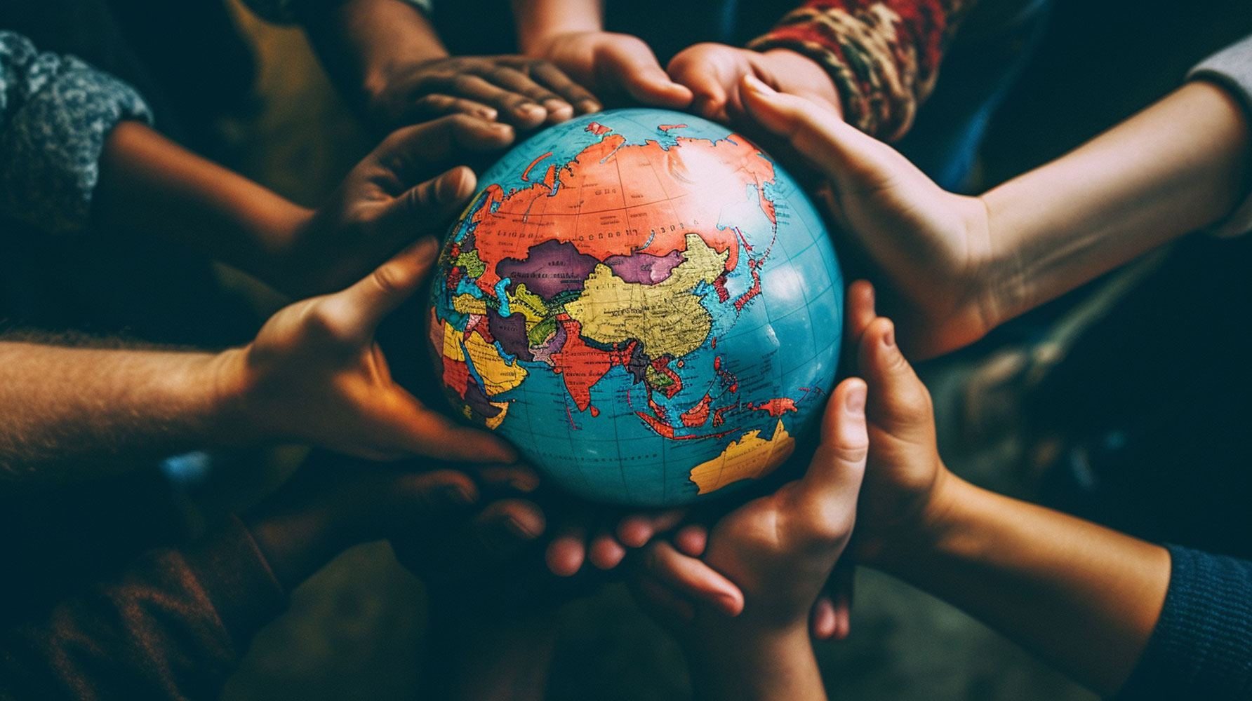 Hands holding a globe