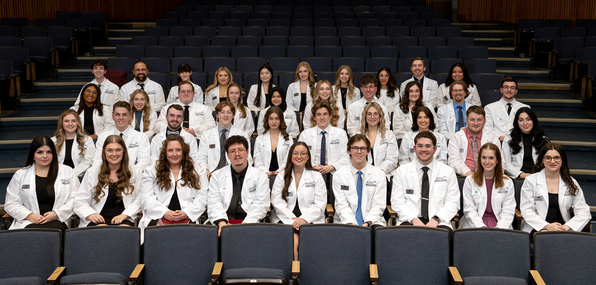 White Coat Ceremony 2024 - Class of 2028 - First-year students in the auditorium after the White Coat Ceremony.