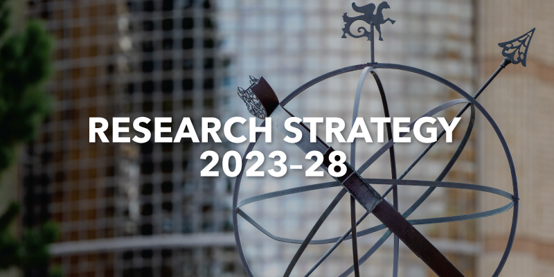 A photo of an armillary sphere and building with the text Research Strategy 2023-28